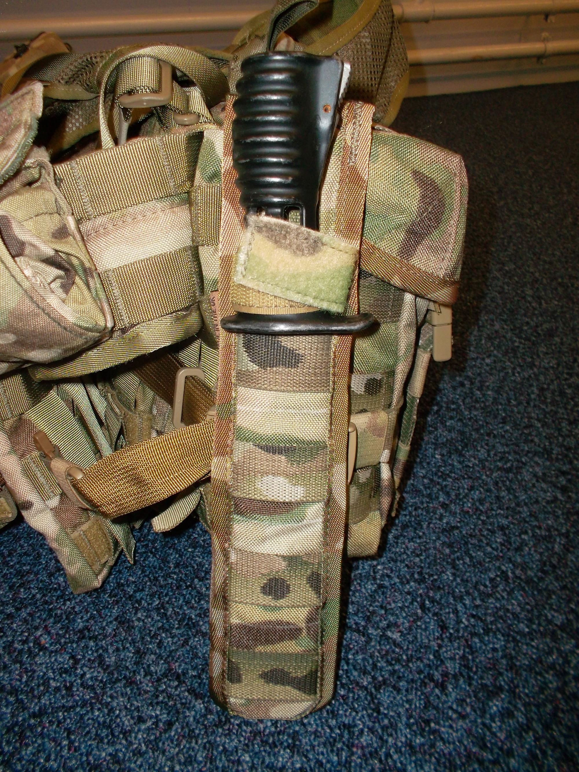Sheath on side of pouch